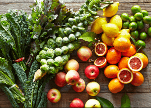 a group of fruits and vegetables on a wood surface Healthy Weight Loss Diets Ware